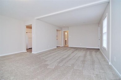 Living room opens to dining room on the other side