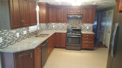 Roomy Kitchen with stainless steel appliances and