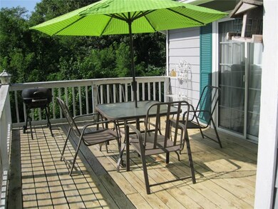This deck area is large enough for a hot tub!