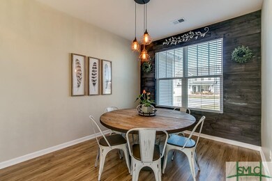 Dining room chic wood accent wall & fabulous light