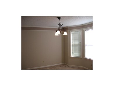 Spacious dining room. New carpeting, New paint