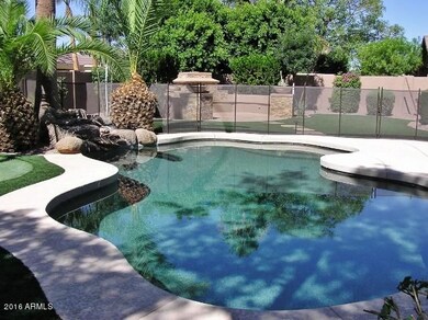 FENCED PEBBLE TECH POOL