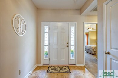 This foyer welcomes you to the house you deserve.