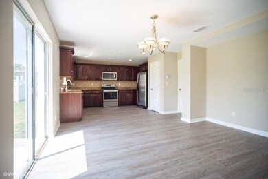 From Family Room - Dining and Kitchen Area