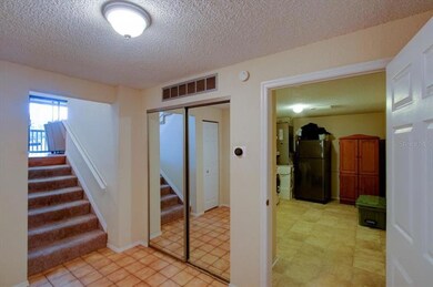 Foyer has access to the garage and a very spacious laundry room, plus an additional closet. 
