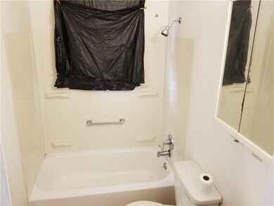 Each unit has a tub/shower and vanity.