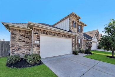 Charming two-story home with a brick and stone ext