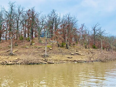 View of cabin and property from the water