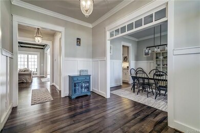 Formal dining room sits to the right of the foyer.
