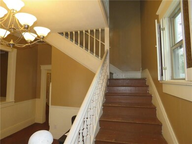 Foyer with staircase.