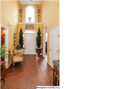 Bright two-story foyer with ceramic tile. Very lig