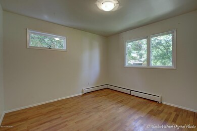 Bedroom 2 w/original hardwood floors