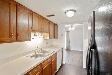 KITCHEN: The efficient galley style kitchen connec