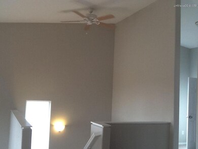 vaulted ceiling with fan