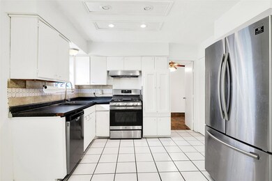 The kitchen is amazing! Features a gas range, lots