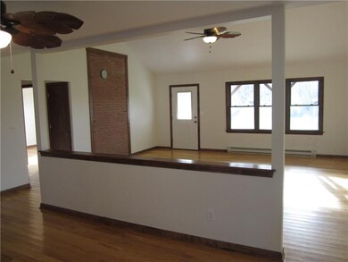 VIEW OF LIVING ROOM FROM DINING AREA. THIS SEPARAT