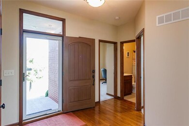 Stained wood trim throughout home.