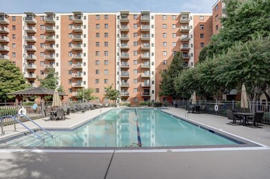 Community pool featuring a gazebo and a patio area