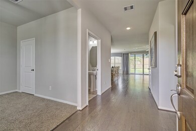 High ceilings and nice sight lines from the moment you open the front door.