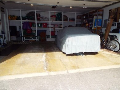Attached two car garage with abundant storage spac