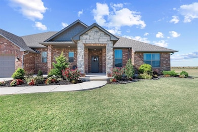 View of front of house featuring brick siding, roo