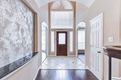 Pictured is the grand foyer and entrance into the home.