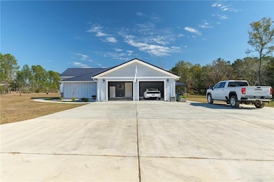 View of front of property featuring a front yard a