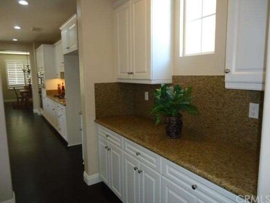 A butler's pantry sits between the formal dining r