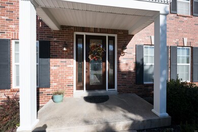 A covered porch to greet your guests and protect your home deliveries!
