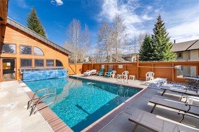 Clubhouse with outdoor, heated pool.