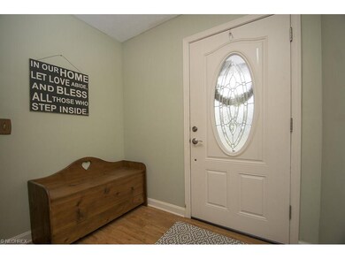 Foyer entry has hard wood floor