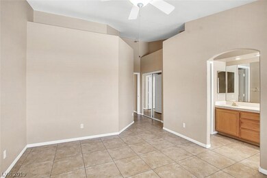 Master bedroom with pot shelves and large walk in