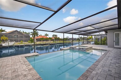 View of pool with a pool with connected hot tub, a