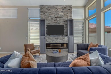 Living room with views and fireplace