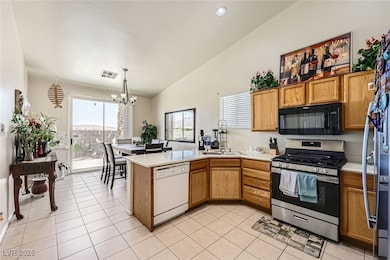Kitchen featuring stainless steel appliances, a pe