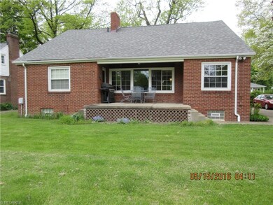 The back of the house showing the large windows an
