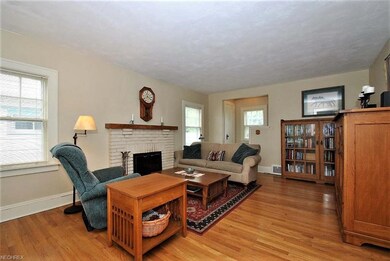 Large and light filled living room with wood floor
