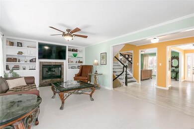 Great Room with Cork Flooring & Built-In Bookshelv