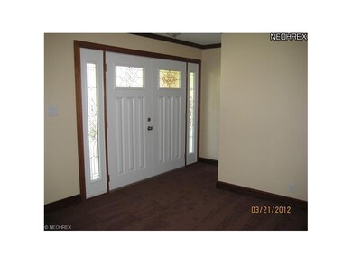 Foyer with double doors - very convenient for moving in furniture.