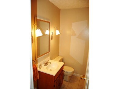 Half Bath off downstairs hallway.