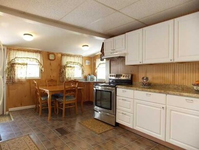 Kitchen. Kitchen downstairs opens out to the patio