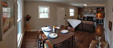 Living room is large enough to provide a dining area as well. Side entry door opens to the living room. Lots of windows provide plenty of natural light.