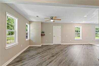 Unfurnished room featuring wood finished floors, a