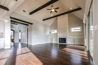 Vaulted greatroom with beams and 