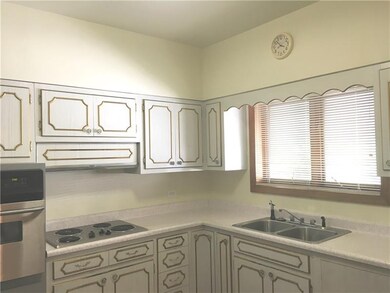 There is a garbage disposal under the sink and a s