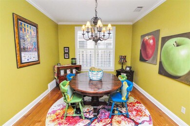 A large dining room is just off the foyer that off