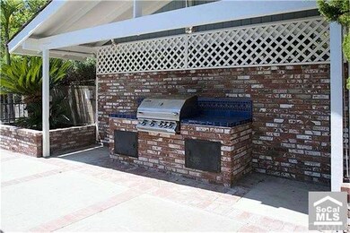 BBQ the ribs while others are enjoying the pool.