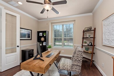 The finest touches are in the home office/study.  These include wood flooring, crown molding, chair rail and glass inserts in the french doors   The office window gives the homeowner a perfect view out front.