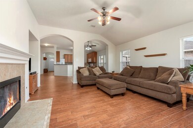Living Room - Angle 2 showing the TV nook and the kitchen and casual dining area