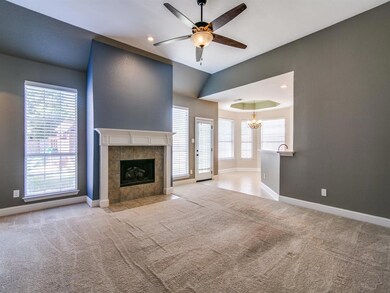 Living area opens to breakfast area with bay window, &  breakfast bar